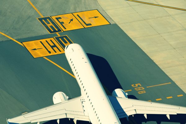 Commercial aircraft on a airfield runway